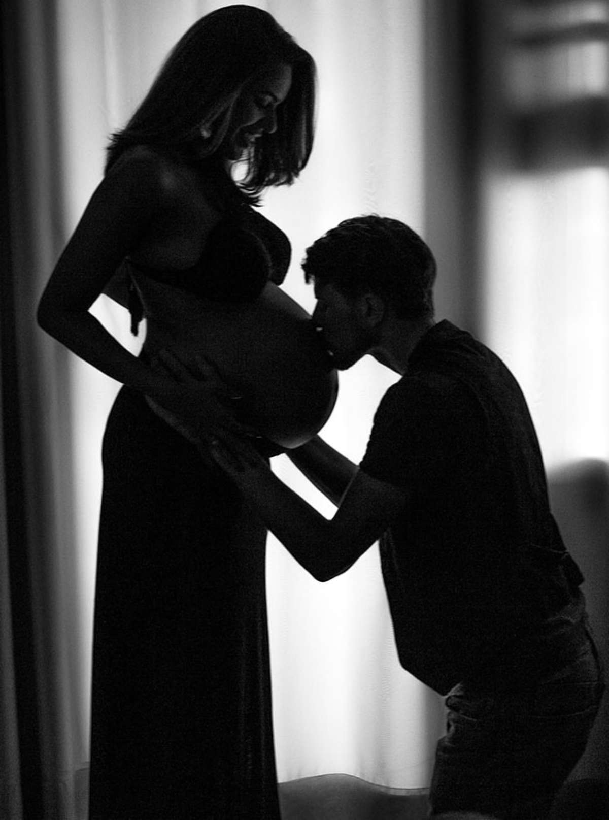 black and white photo of husband kissing his wife's belly | Stunning Maternity Pictures, Ideas, And Photo Shoot Themes