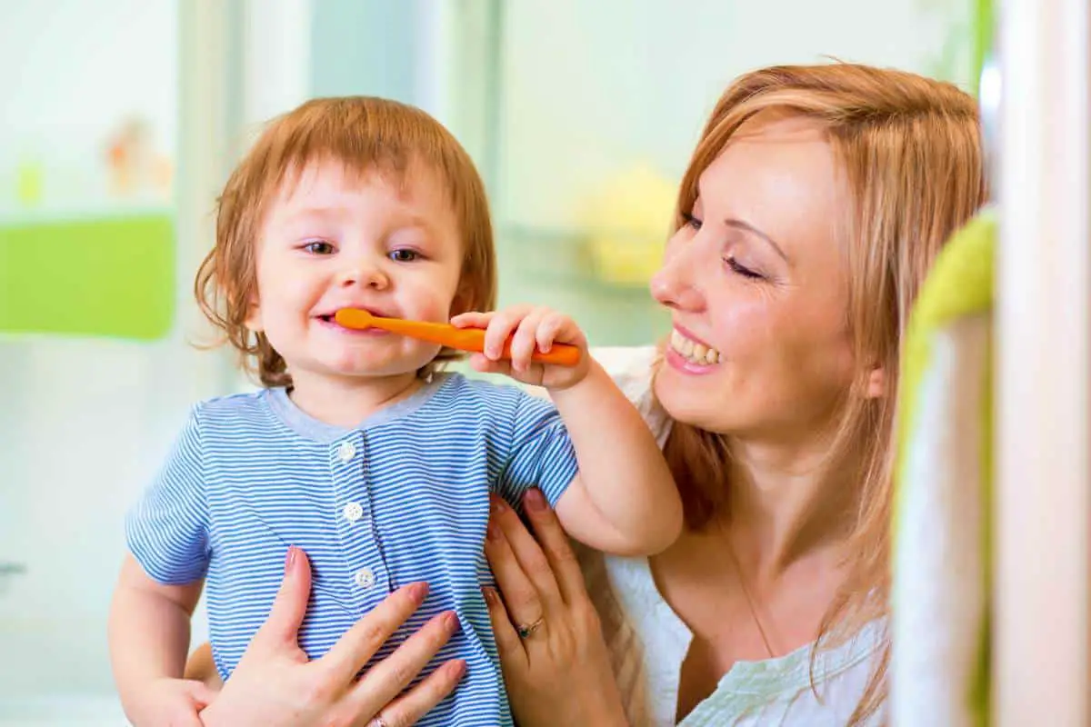 Kid Brushing Teeth | Key Toddler Developments and Milestones | toddler development